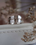Focus on the good. Sterling Silver adjustable wrap ring
